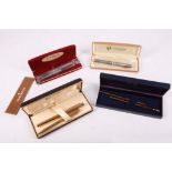 A Schaeffer Sterling silver cased fountain pen, sold with a gold plated pen and pencil set, a Parker