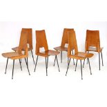 A SET OF SIX 1950s FRENCH PLYWOOD DINING CHAIRS, on black enamelled steel legs (36cm wide x 89cm