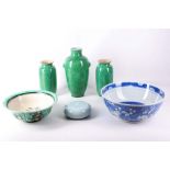 Three apple green vases, a celadon circular box and cover, a figurative famille verte bowl and a