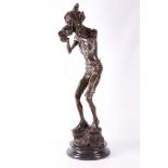 A large reproduction bronze figure of an elf numbered 1/50, 84cm high.