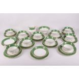 Ten early 20th Century Royal Worcester 'Maple' pattern tea cups and saucers and ten tea plates,