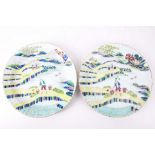 A pair of 19th Century Chinese famille verte landscape plates, with Kangxi marks to reverse.