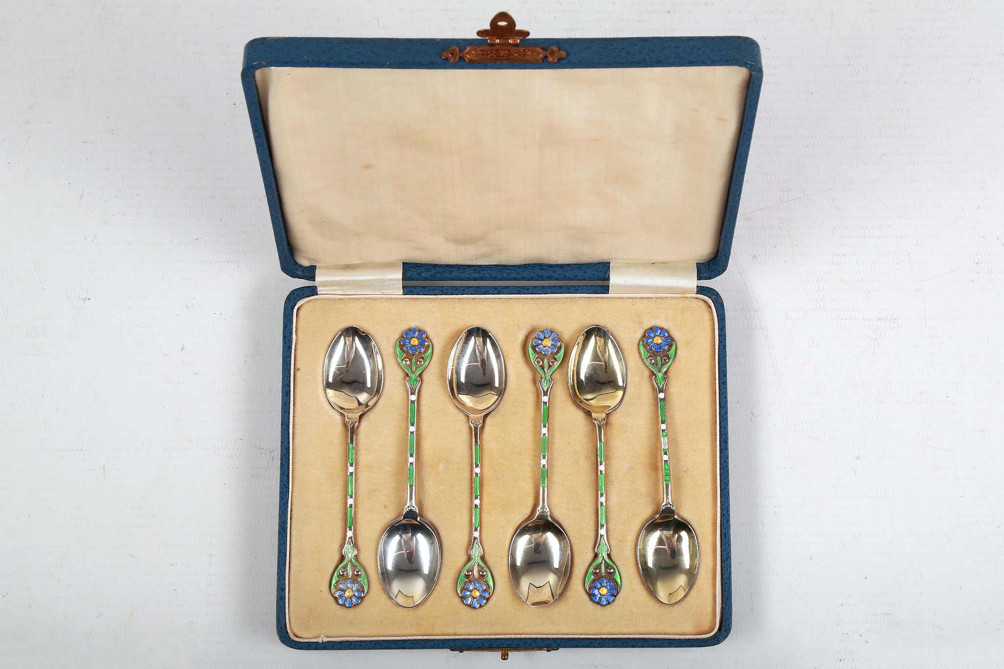 A cased set of Art Deco, hallmarked silver teaspoons, having green and blue enamel flowery - Image 2 of 3