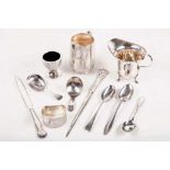 A collection of small hallmarked silver items, to include a cream jug, Sheffield 1931, two