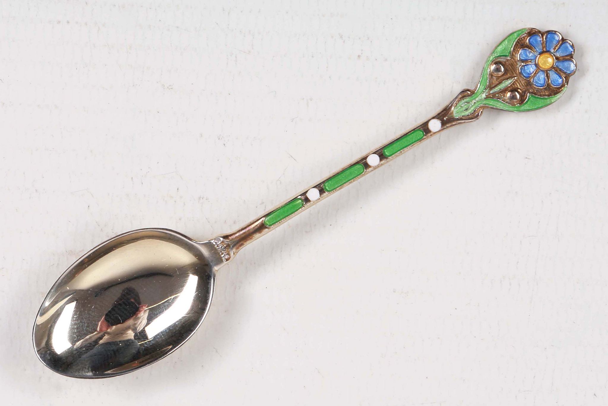 A cased set of Art Deco, hallmarked silver teaspoons, having green and blue enamel flowery - Image 3 of 3