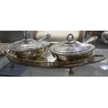 A pair of silver plated serving dishes with covers, together with an oval silver plated twin handled