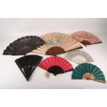 A small collection of late 19th Century and early 20th Century French fans to include a wood and