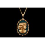 A gold cameo pendant necklace, 1972. The 9 carat yellow gold cameo of a woman in profile with