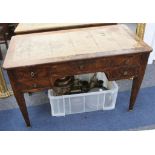 An early 19th Century French Empire flame mahogany bureau plat, 4 drawers, 2 slides, supported on