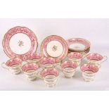 An English porcelain part tea service c.1820, possibly Coalport, richly decorated with gold and pink