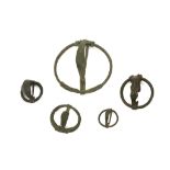 FIVE CELTIC BRONZE BROOCHES Circa 1st Century B.C. Each of annular form with a perpendicular