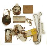 A GROUP OF TRIBAL NECKLACES AND BEADS, Including a decorative coconut, painted with a floral