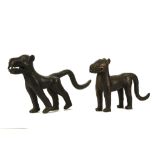 TWO BRONZE BENIN-STYLE LEOPARDS Both of similar stylised design, bearing their teeth and with