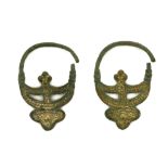 A PAIR OF BYZANTINE GILT BRONZE EARRINGS Circa 10th-12th Century A.D. Of crescent form, with trefoil