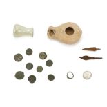 A GROUP OF ROMAN ANTIQUITIES Circa 3rd-4th Century A.D. Including a terracotta oil lamp, 9.5cm long;