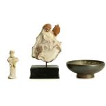 THREE ANCIENT TERRACOTTA ITEMS Circa 3rd Millenium B.C.-3rd Century A.D. A composite Roman