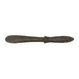 A WOODEN LIME SPATULA, PAPUA NEW GUINEA Carved with a band of zig-zag design, concentric circles and