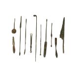 A GROUP OF ROMAN BRONZE IMPLEMENTS Circa 1st-3rd Century A.D. Including a pair of tweezers, 8.7cm