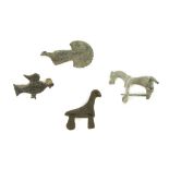 FOUR ROMAN BRONZE ANIMAL BROOCHES Circa 5th Century B.C.-2nd Century A.D. Including one in the