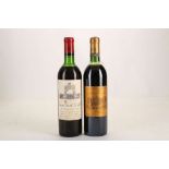 A 1985 Chateau D'Issan, Margaux, Grand Cru Classè cellar tag, 75cl (ABV unknown), and a bottle of