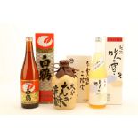 A Fabuki 2015 Limited Edition Sake, 720ml (ABV unknown), a Kakutsuru Sake, 750ml (14.5% ABV), and