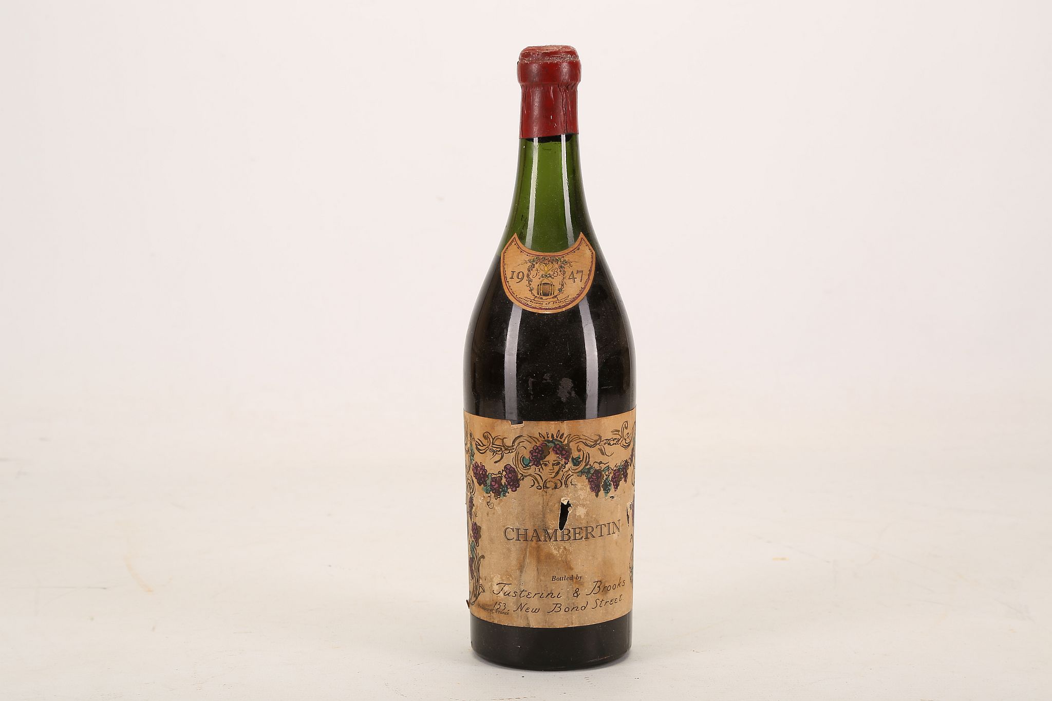 A 1947 bottle of Chambertin Burgundy, bottled by Justerini and Brooks, 70cl. *This bottle has been