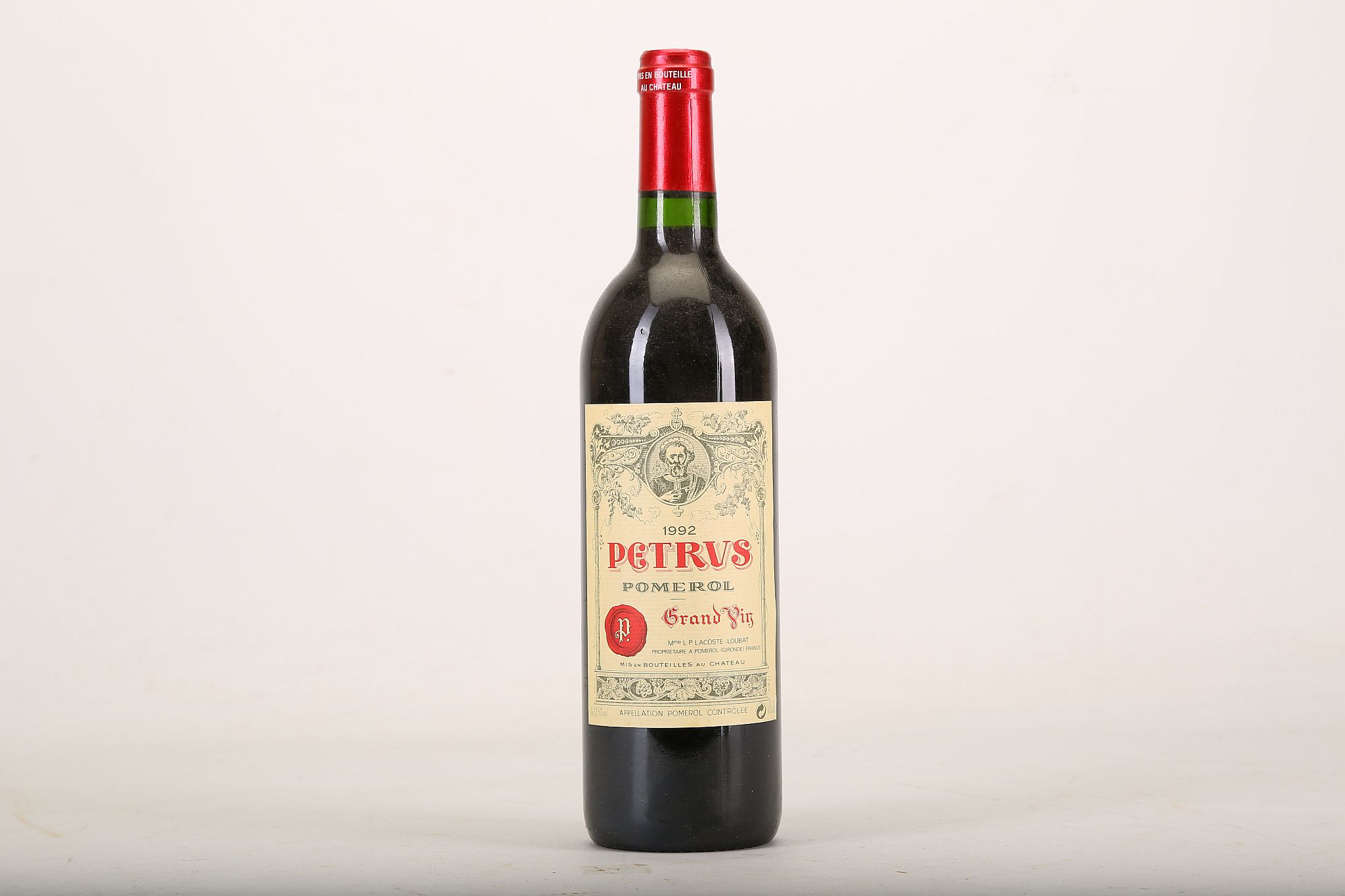 A 1992 Petrus, Grand Vin, Pomerol, Mme L.P. Lacoste-Loubat Proprietaire, 75cl (13.5% ABV).