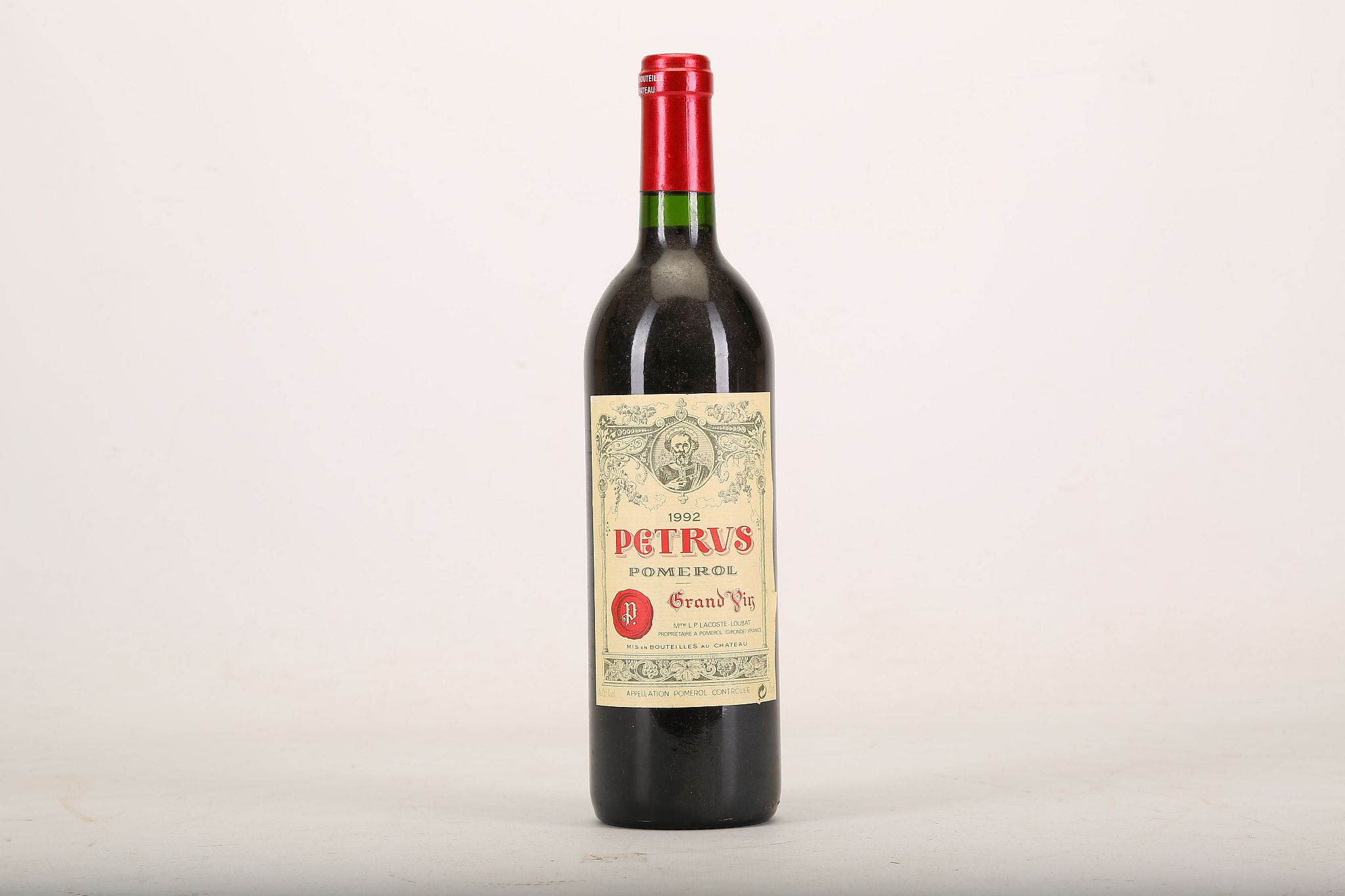 A 1992 Petrus, Grand Vin, Pomerol, Mme L.P. Lacoste-Loubat Proprietaire, 75cl (13.5% ABV).  *This