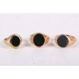 Three late 19th / early 20th century bloodstone signet rings. UK hallmarks for 9 and 15 carat yellow