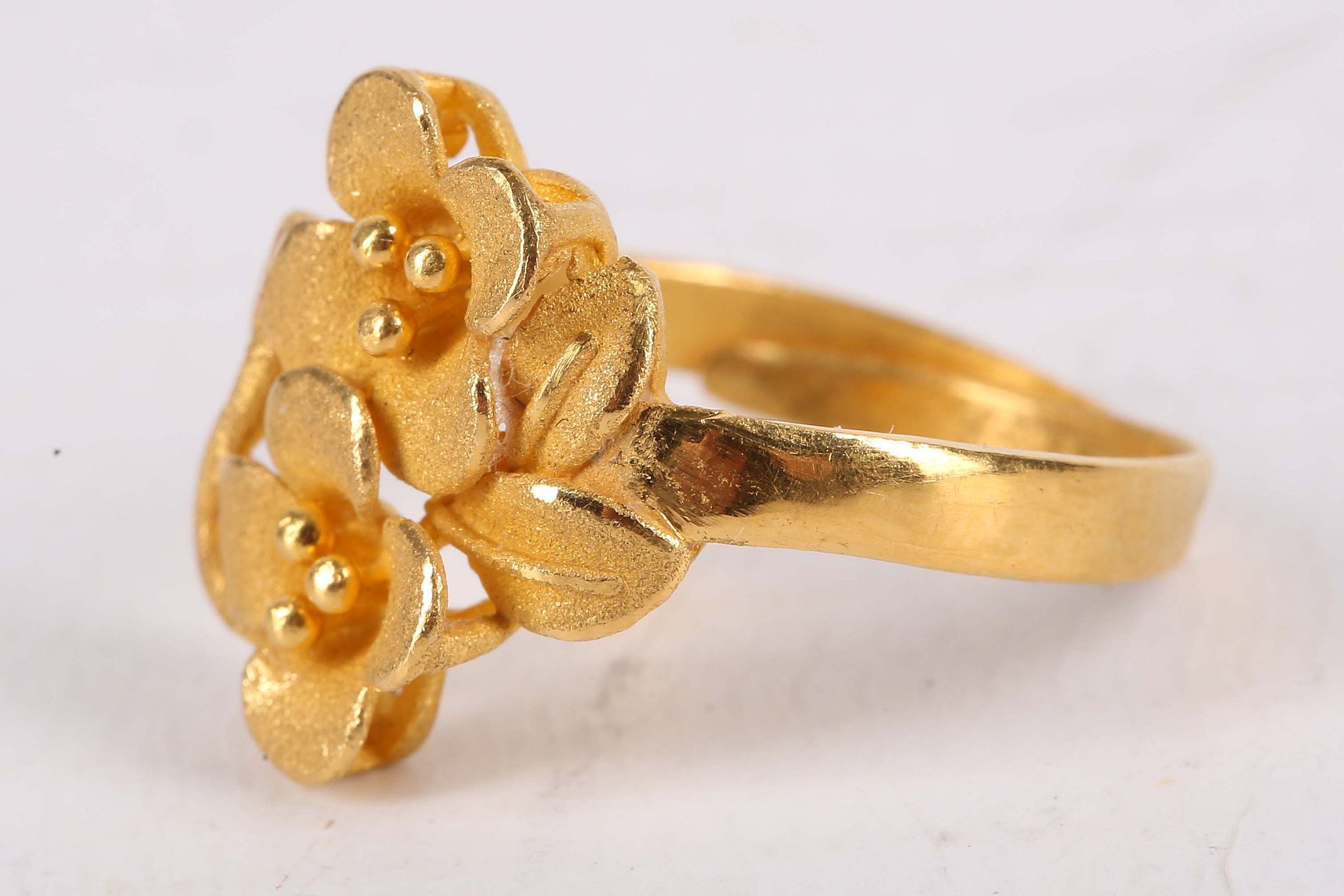 A flower ring, The two brushed flowerheads, stamped '9999', ring size L, approx. weight 4.7 grams. - Image 3 of 3