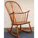 An Ercol elm Chairmaker's Windsor rocking chair, c.1970.