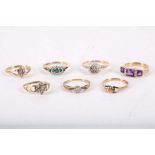A collection of rings, set with CZ, diamonds, emeralds and amethyst, some with UK hallmarks for 9