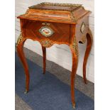 A French late 19th century kingwood crossbanded cabinet with gilt brass ornate mounts, on square