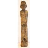 An oceanic carved wooden figure, 97cm high.