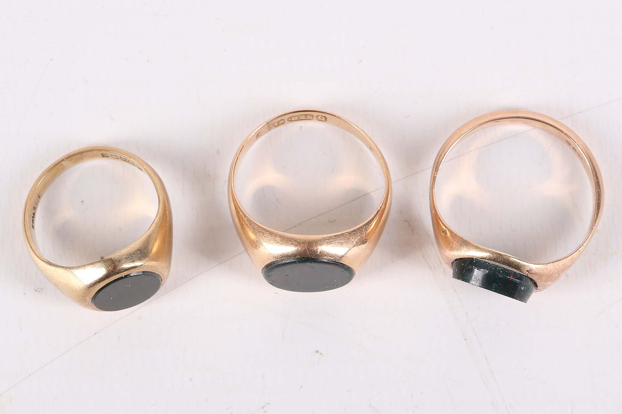 Three late 19th / early 20th century bloodstone signet rings. UK hallmarks for 9 and 15 carat yellow - Image 2 of 3