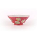 A Chinese Qing period (1644-1912), scalloped flare shape rose pink ground bowl, having decoration