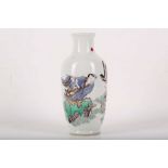 A Chinese famille verte figurative vase, 16.5cm high