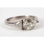 A platinum and diamond engagement ring, the central round brilliant cut stone measuring 1.35ct and