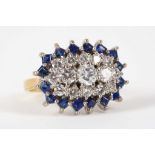 An 18ct yellow gold, diamond and sapphire cluster dress ring.