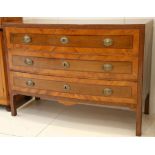 A continental kingwood and walnut commode, bow fronted with parquetry banding, with three long