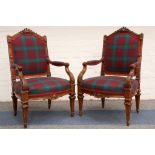 A pair of 19th Century French open armchairs with well carved frames, on square tapering legs,