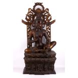 A large and impressive bronze seated Buddha, 75cm high