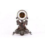 A 19th Century drum barometer, supported by bronze patinated cherubs, on decorative base.