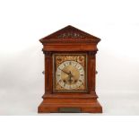 Early 20th Century oak table clock by Winterhalder & Hofmeier, the architectural case with plaquette
