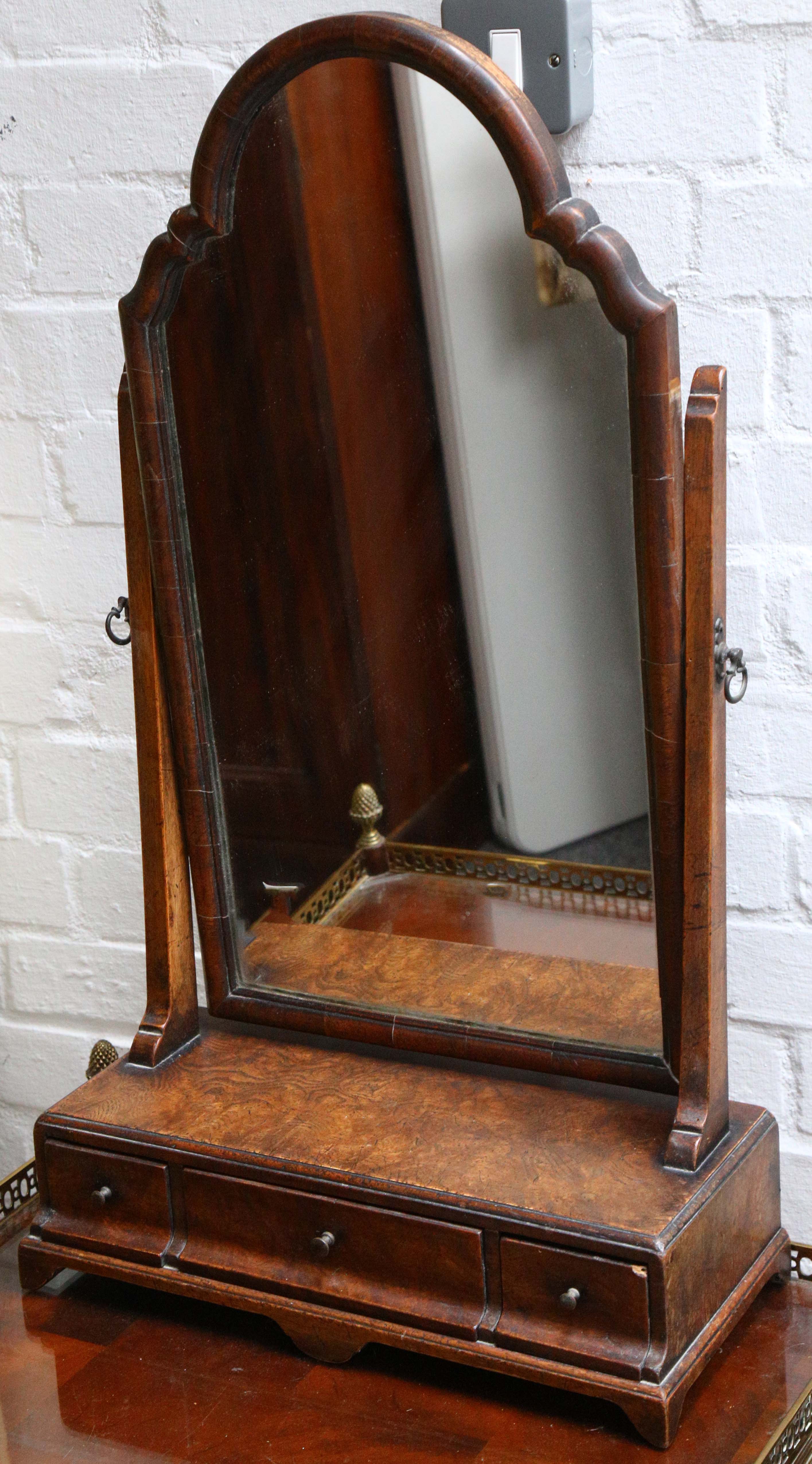 A late Georgian table top dressing mirror with single drawer.