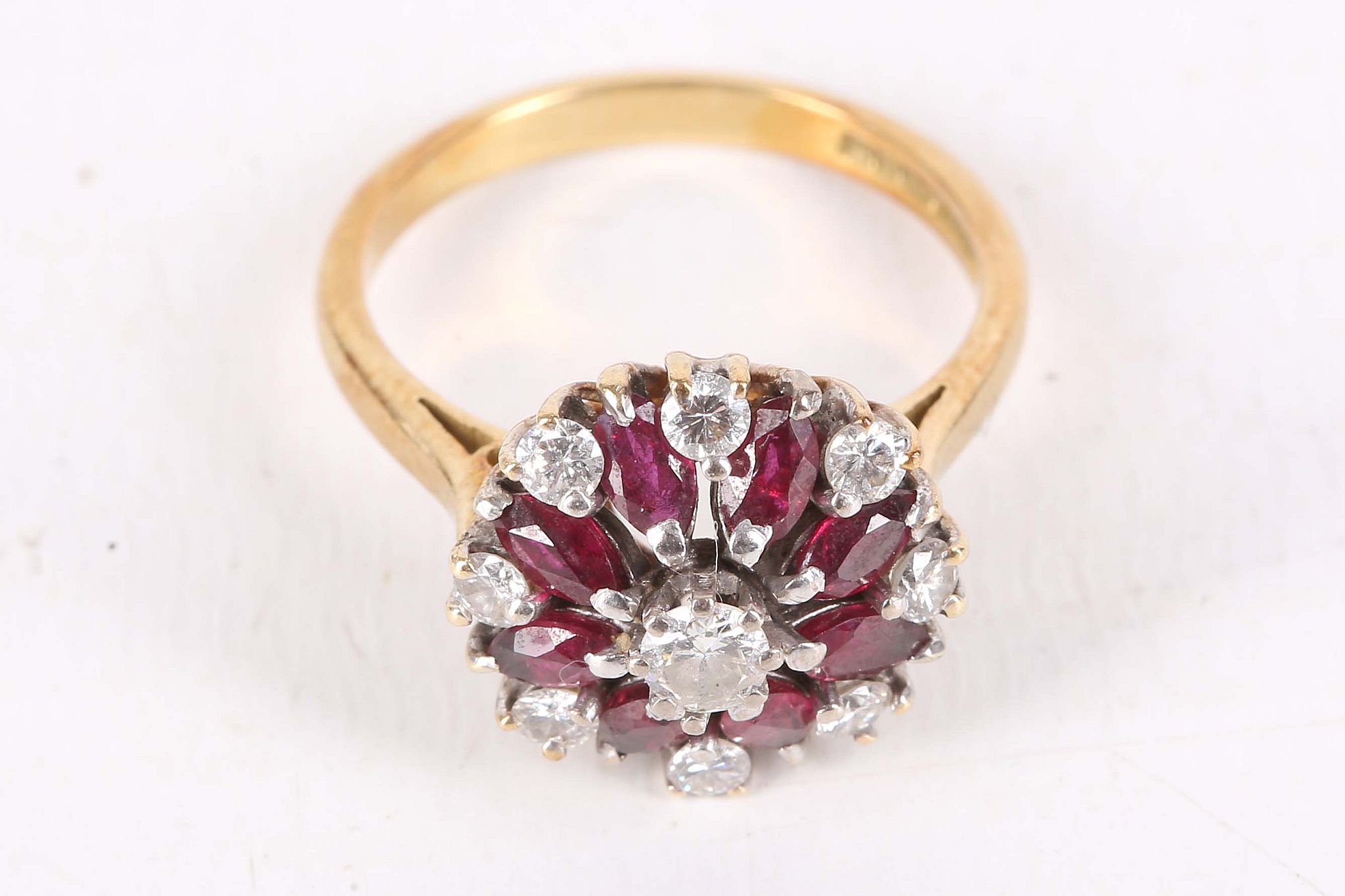 A garnet and diamond cluster ring, Set with circular-cut garnets and brilliant-cut diamonds, mounted - Image 2 of 3