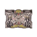 AN EARLY 20TH CENTURY HAMMERED AND PAINTED PEWTER NOVELTY WALL CLOCK  the shaped flat dial with a
