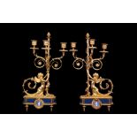 A FINE PAIR OF 19TH CENTURY FRENCH GILT BRONZE, ENAMEL AND JASPERWARE FIGURAL CANDELABRA each