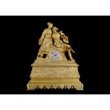 AN EARLY 19TH CENTURY FRENCH GILT BRONZE FIGURAL MANTEL CLOCK IN THE ORIENTALIST TASTE BY VICTOR