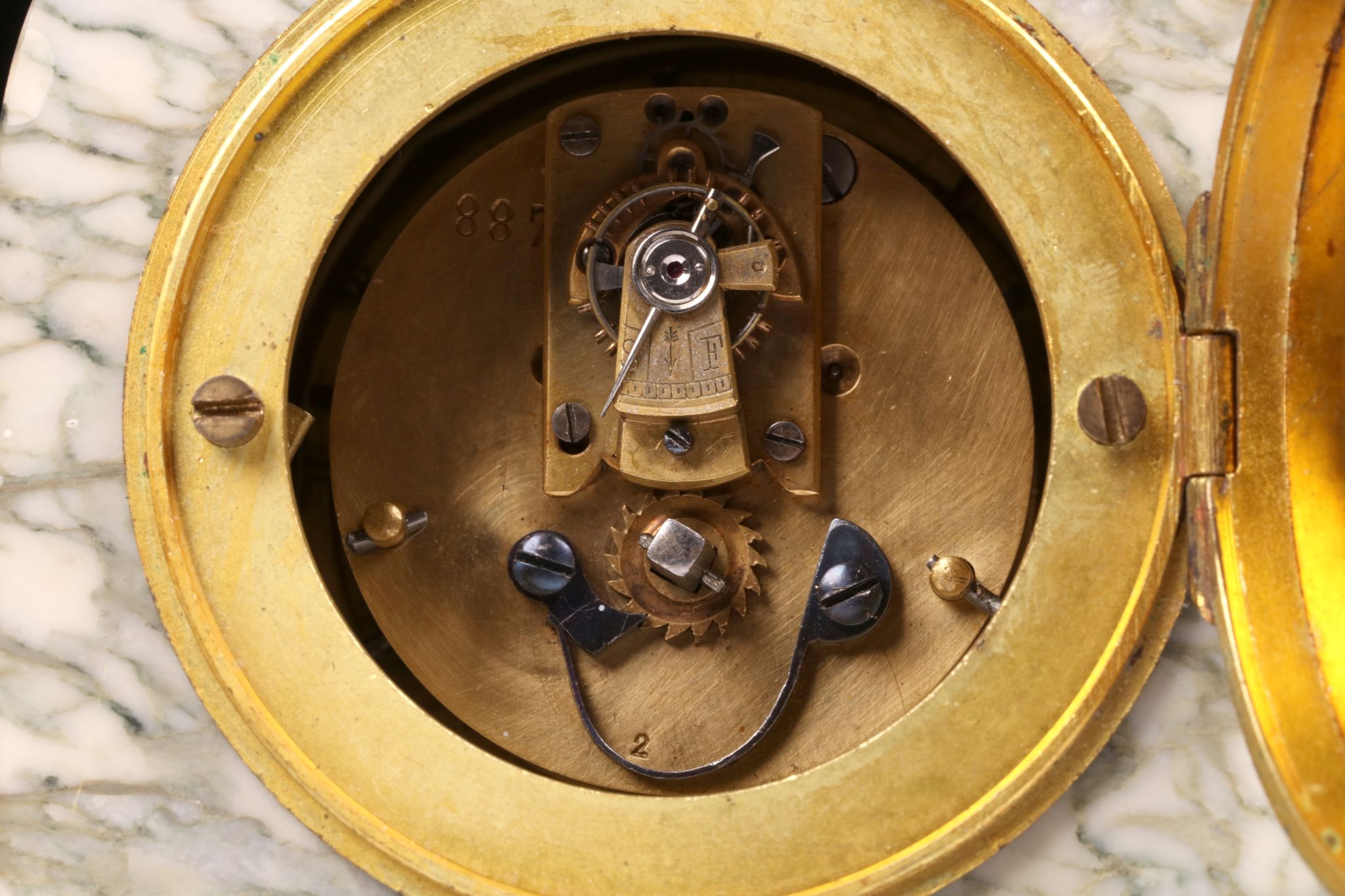 A LATE 19TH CENTURY FRENCH MARBLE AND GILT BRONZE MOUNTED BOUDOIR CLOCK the arched case surmounted - Image 7 of 7